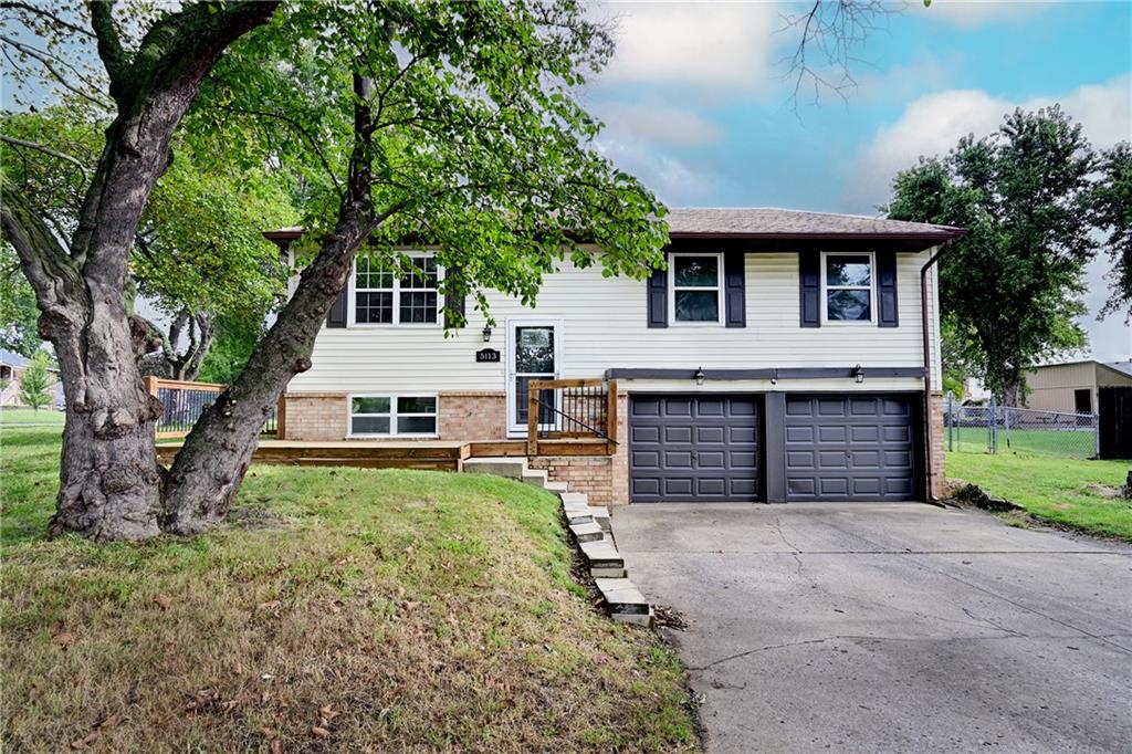 5113 NW Downing Street — photo