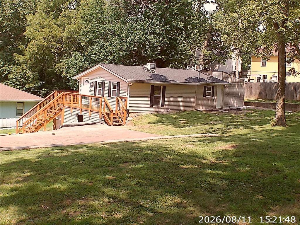 11406 E 10th Street S — photo