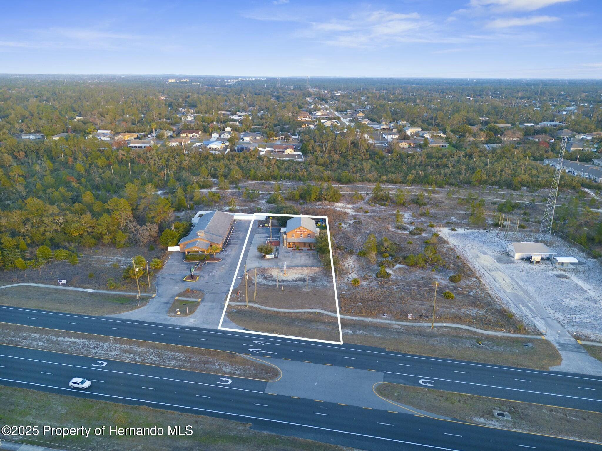 7044 Commercial Way — photo