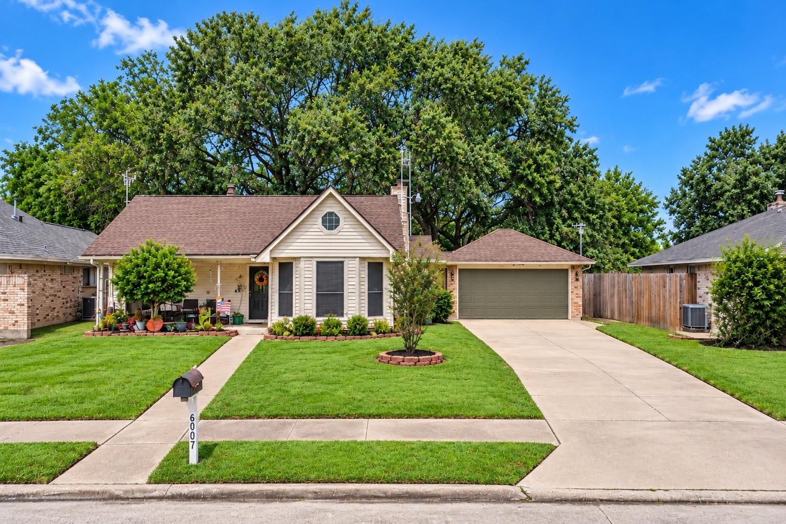 6007 Bee Hive Drive — photo