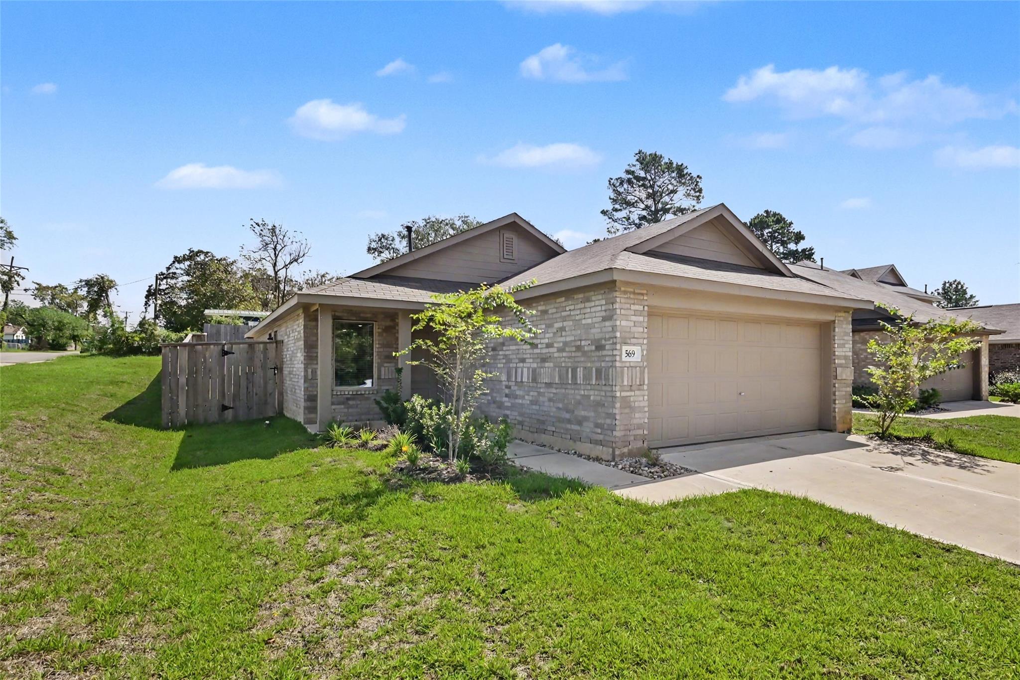 569 Falling Cave Drive, Willis, TX 77378 — photo 2