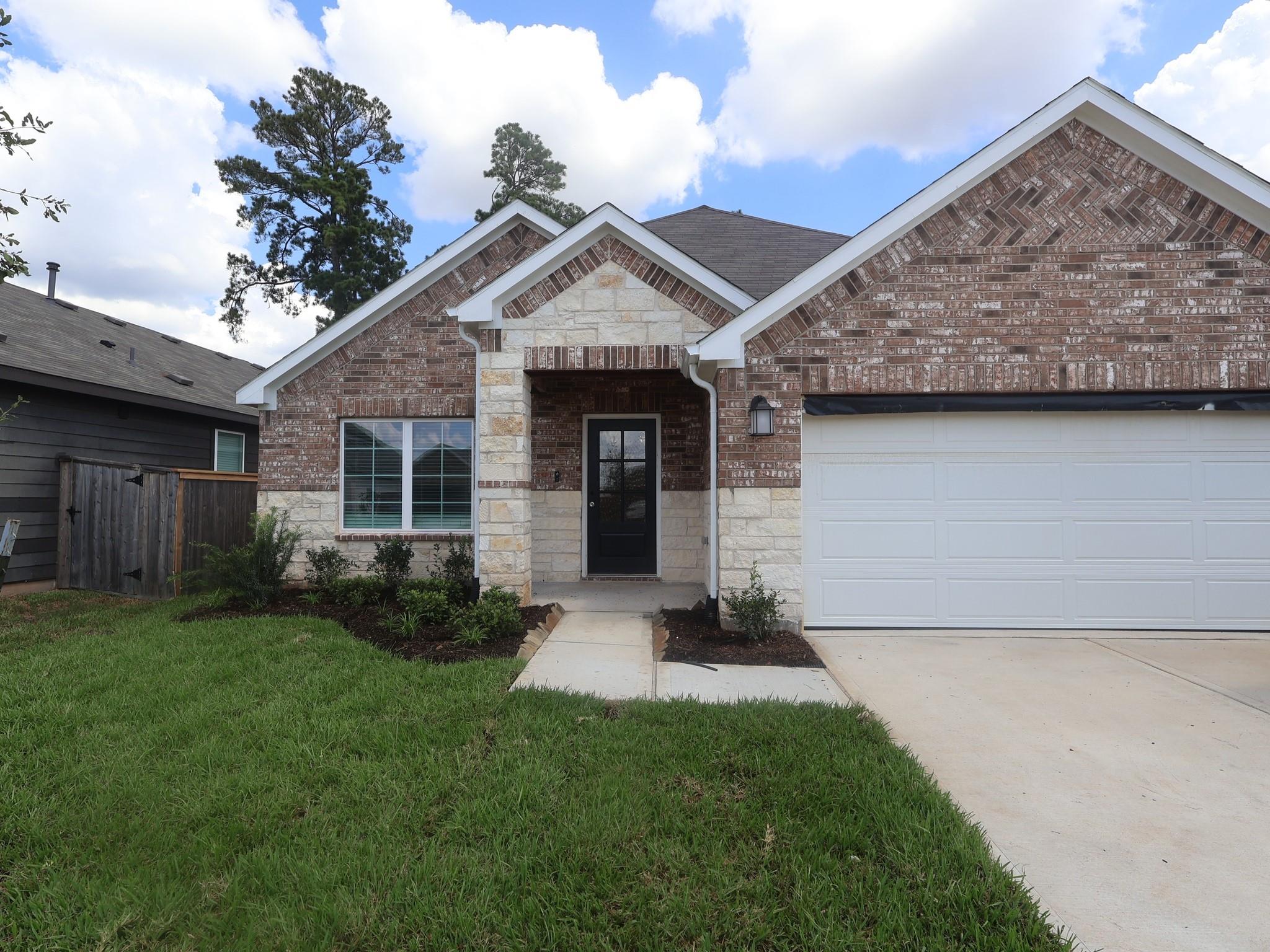 985 Garden Path Drive, Willis, TX 77378 — photo 2