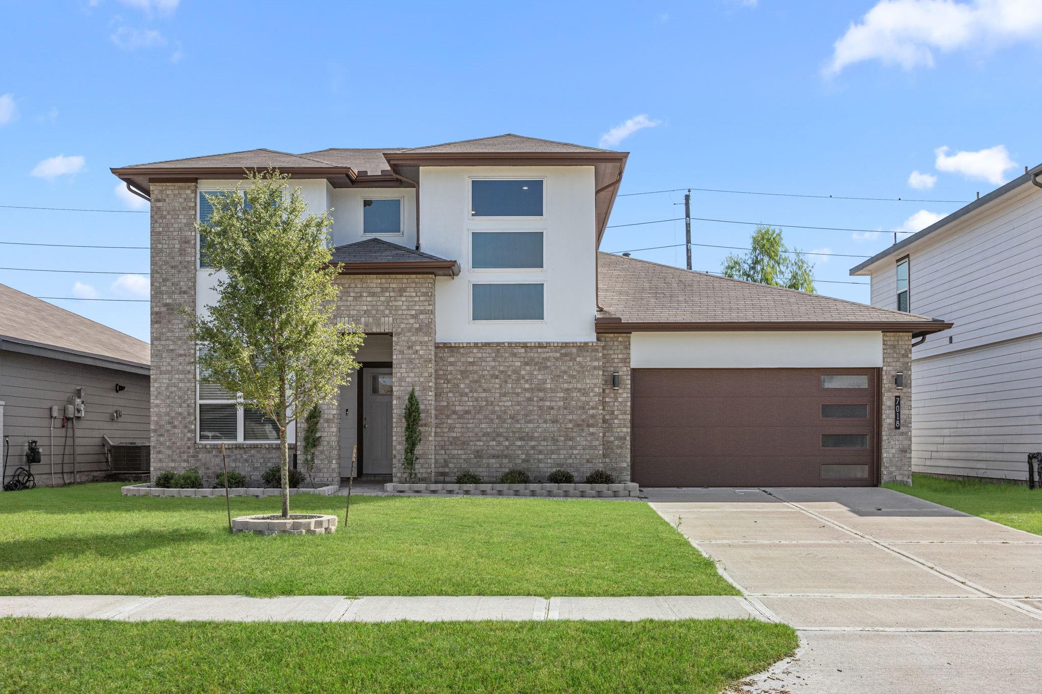 7018 Whispering Leaf Street — photo