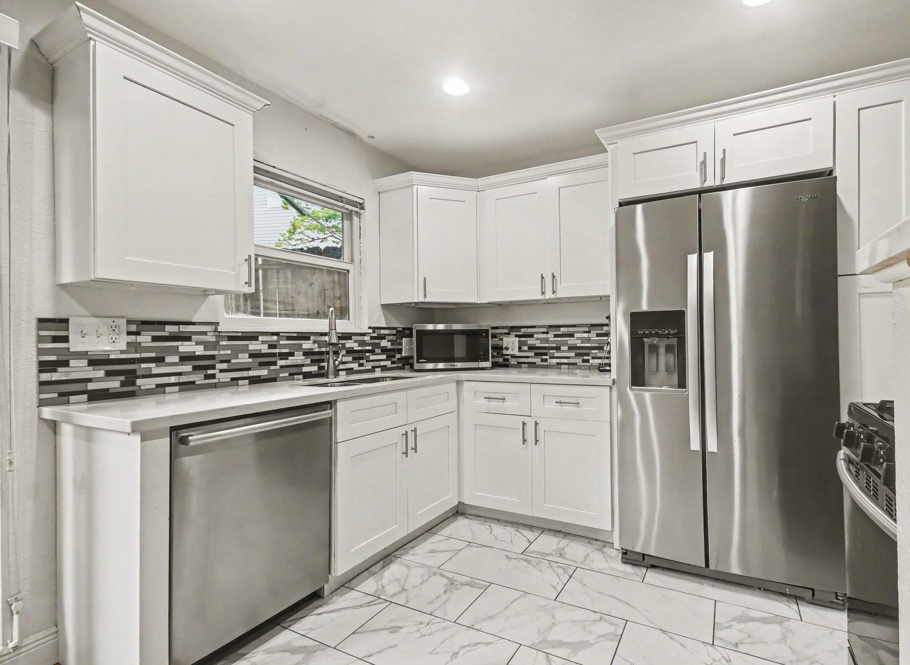 4020 Blue Bonnet Boulevard #K — photo