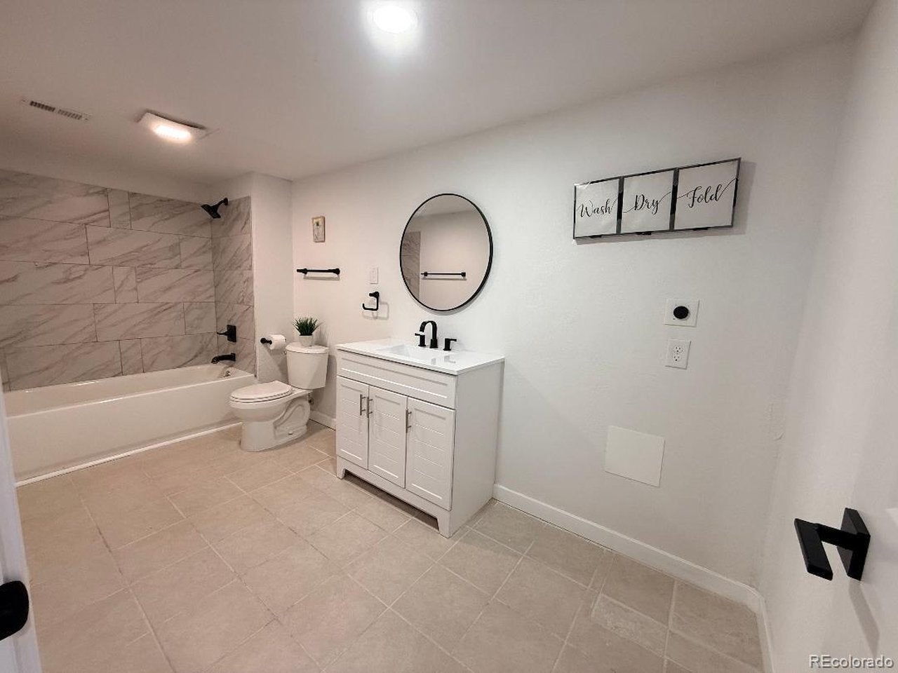Home in Denver, CO 80231 — photo 3