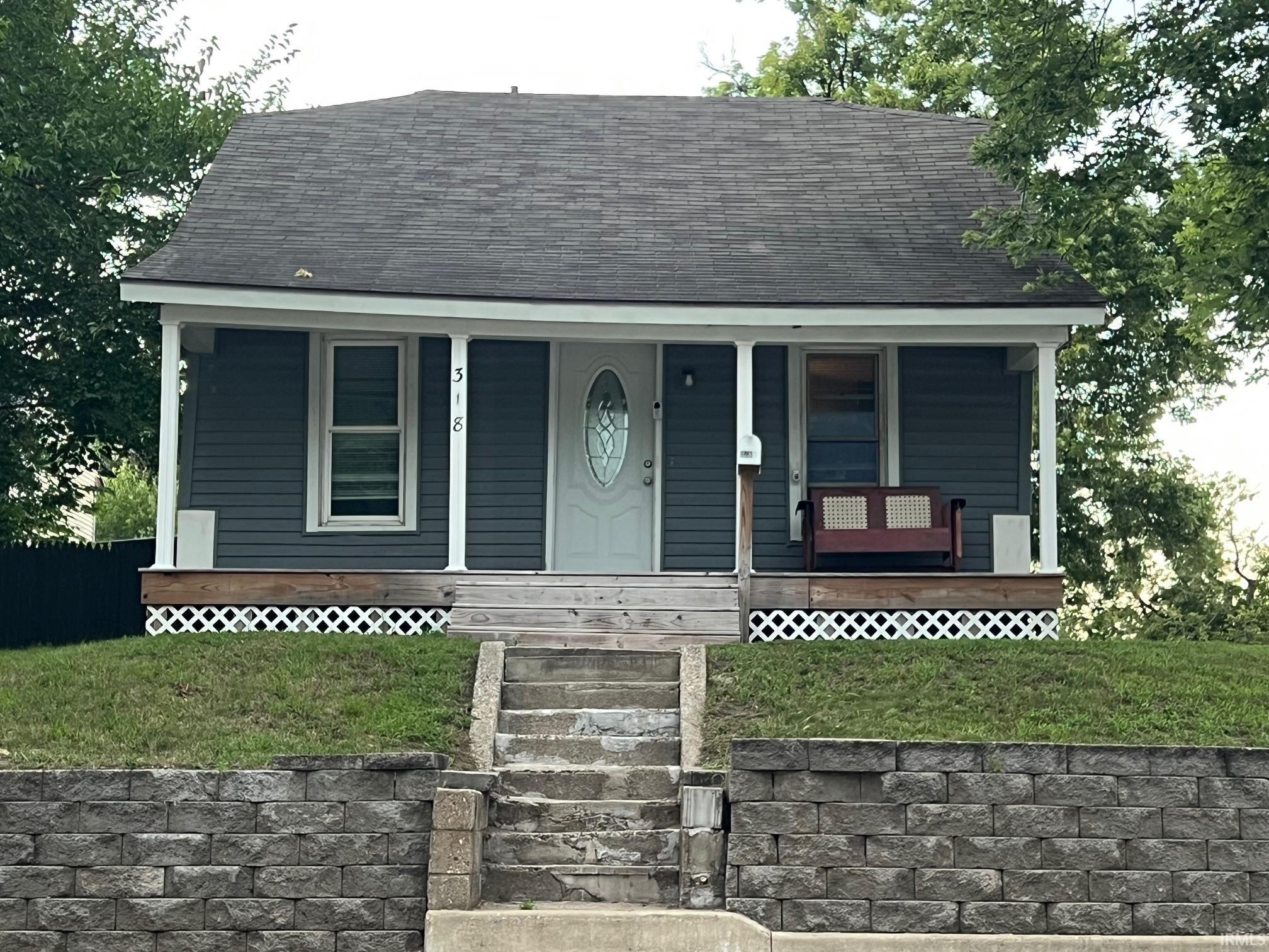 911 N Division & 318 E Battell Street — photo