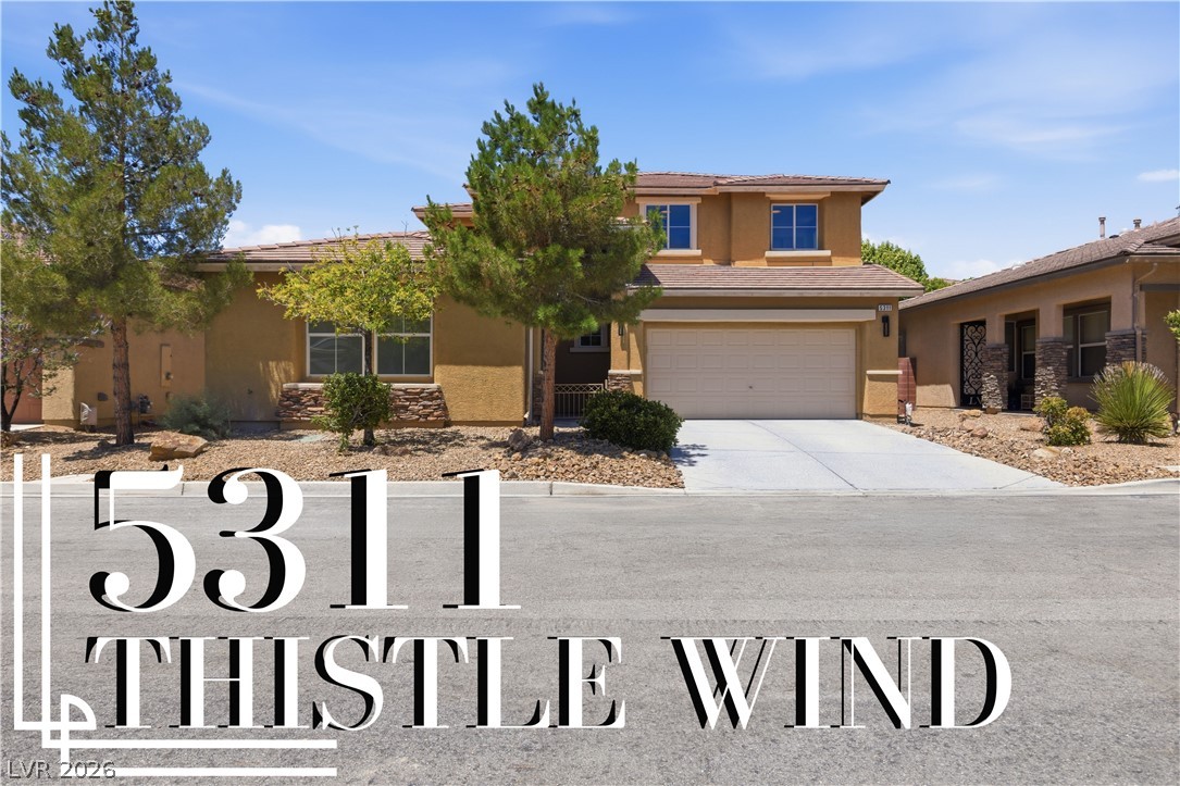 5311 Thistle Wind Drive — photo