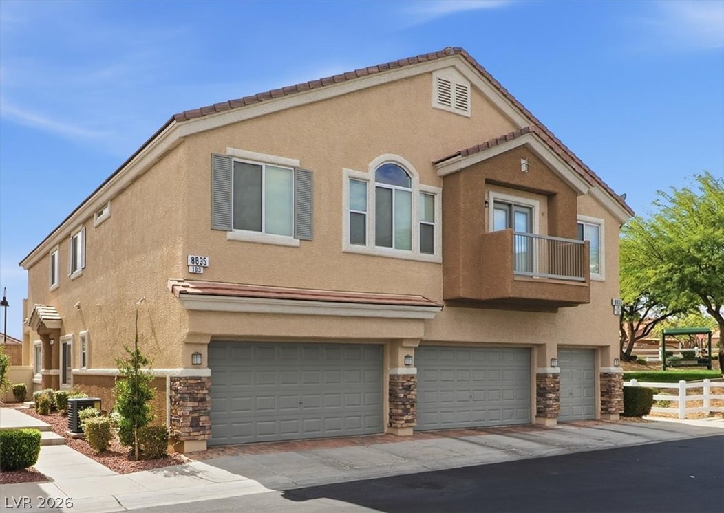 8835 Traveling Breeze Avenue Unit 103 — photo