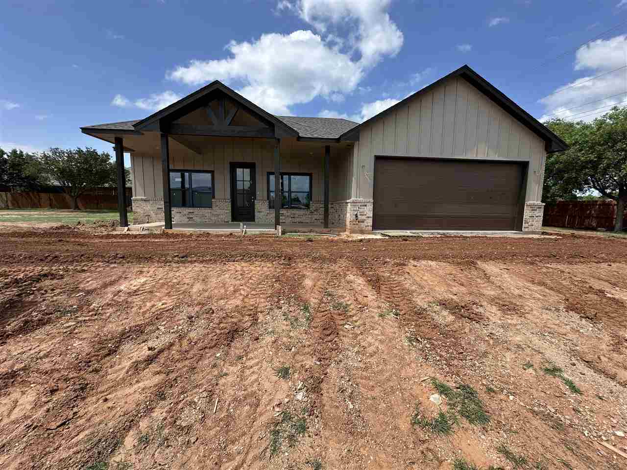 6701 NW Willow Wood Loop — photo