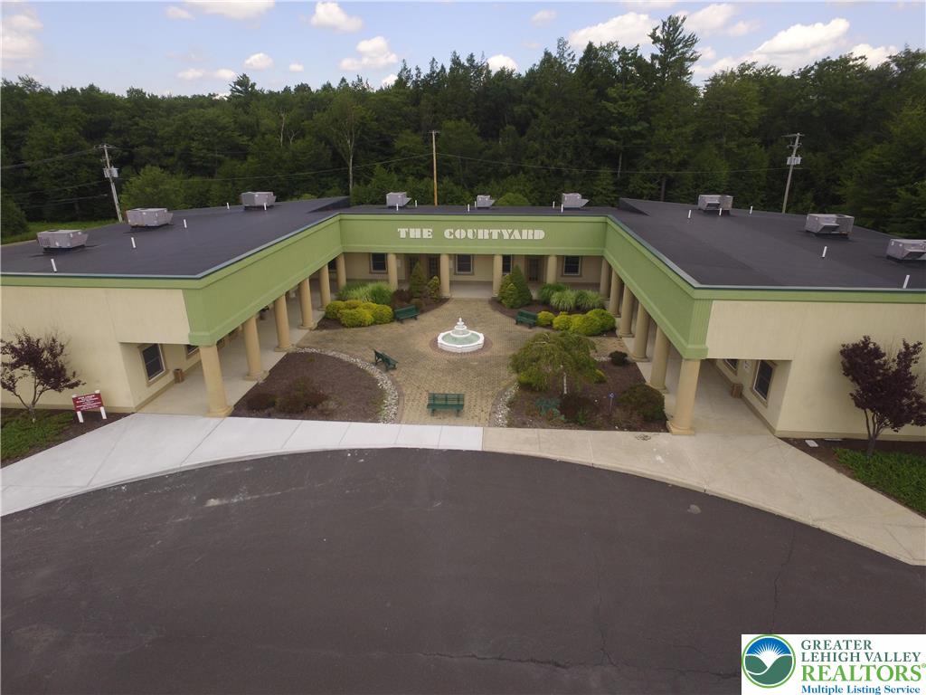 300 Community Drive Suite G — photo