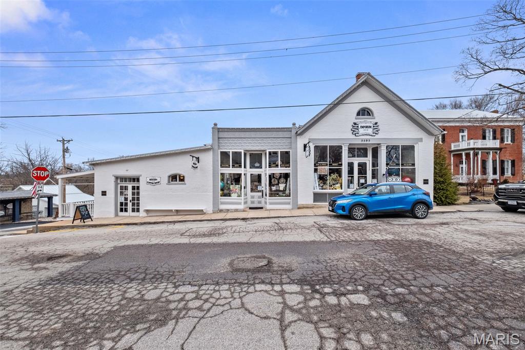 5595 Walnut and .21 Acre Lot on Jackson Street — photo