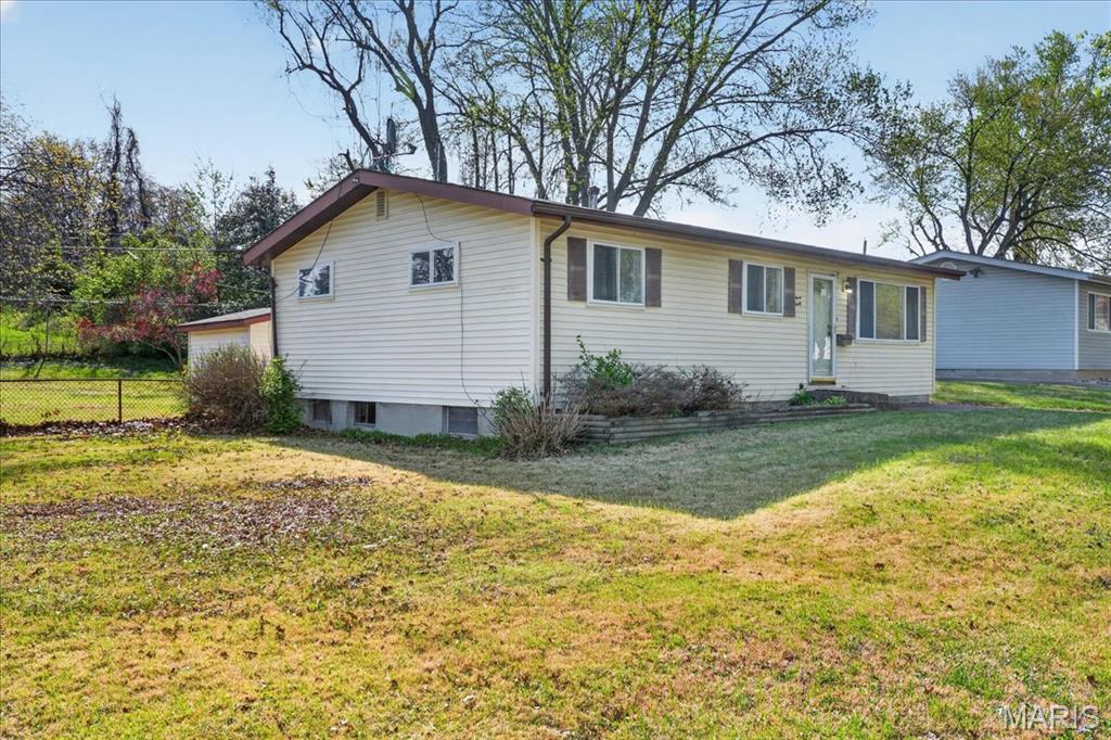 Home in Florissant, MO 63033 — photo 3