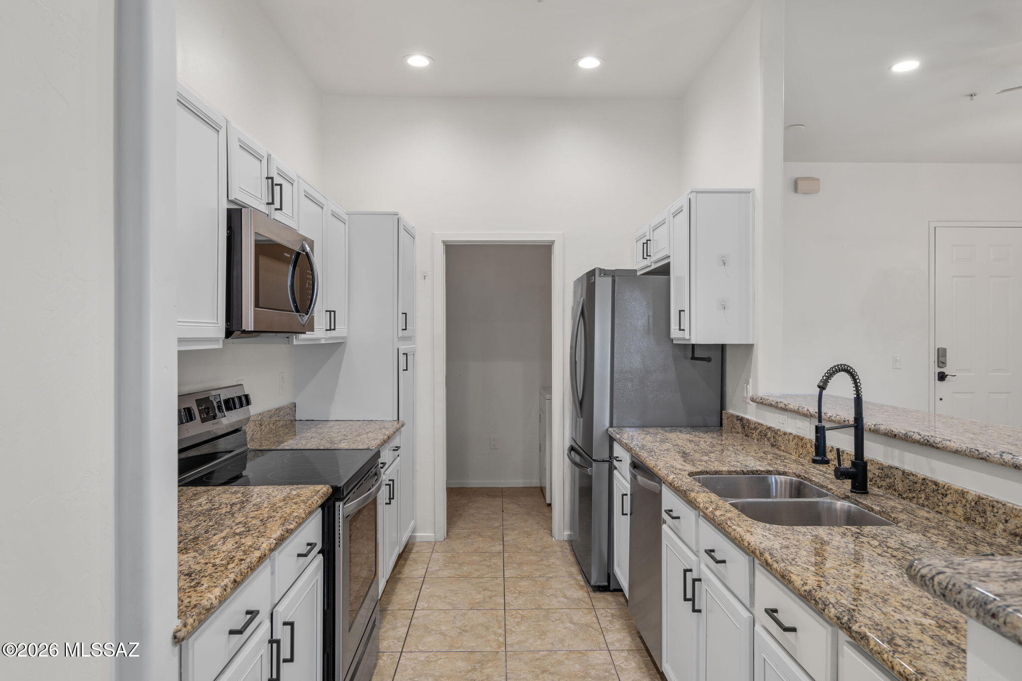 2028 E River Road 203 — photo