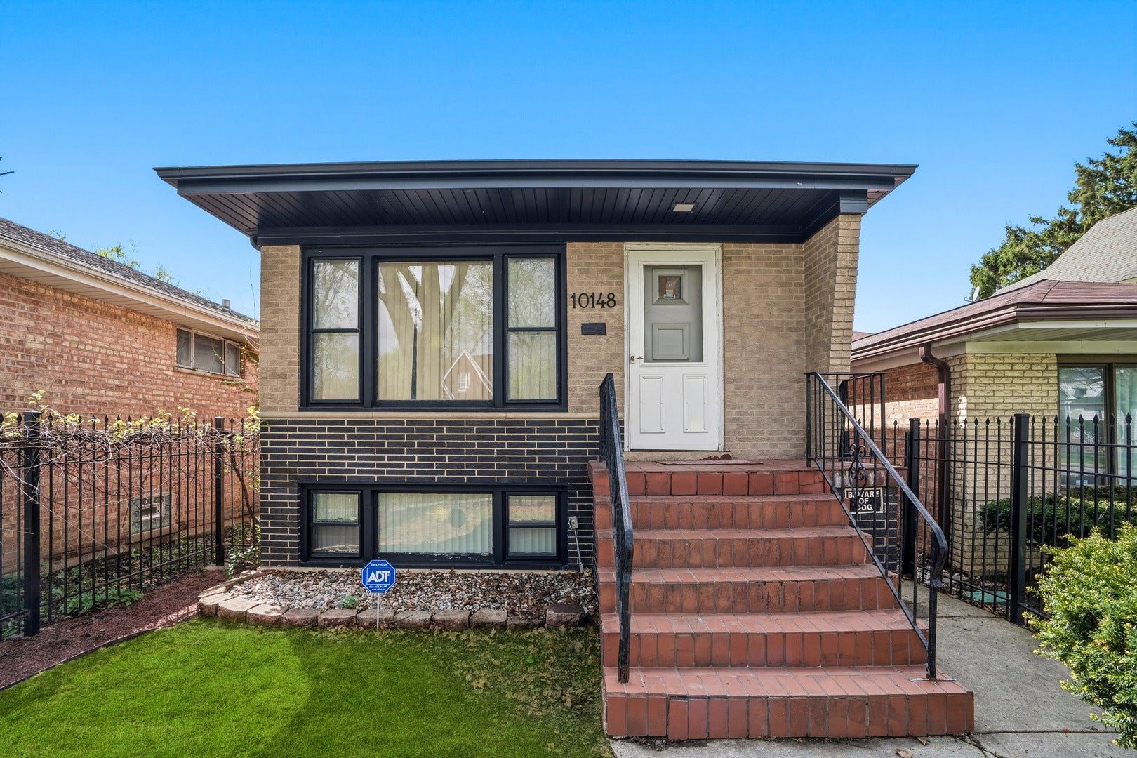 10148 S Peoria Street — photo