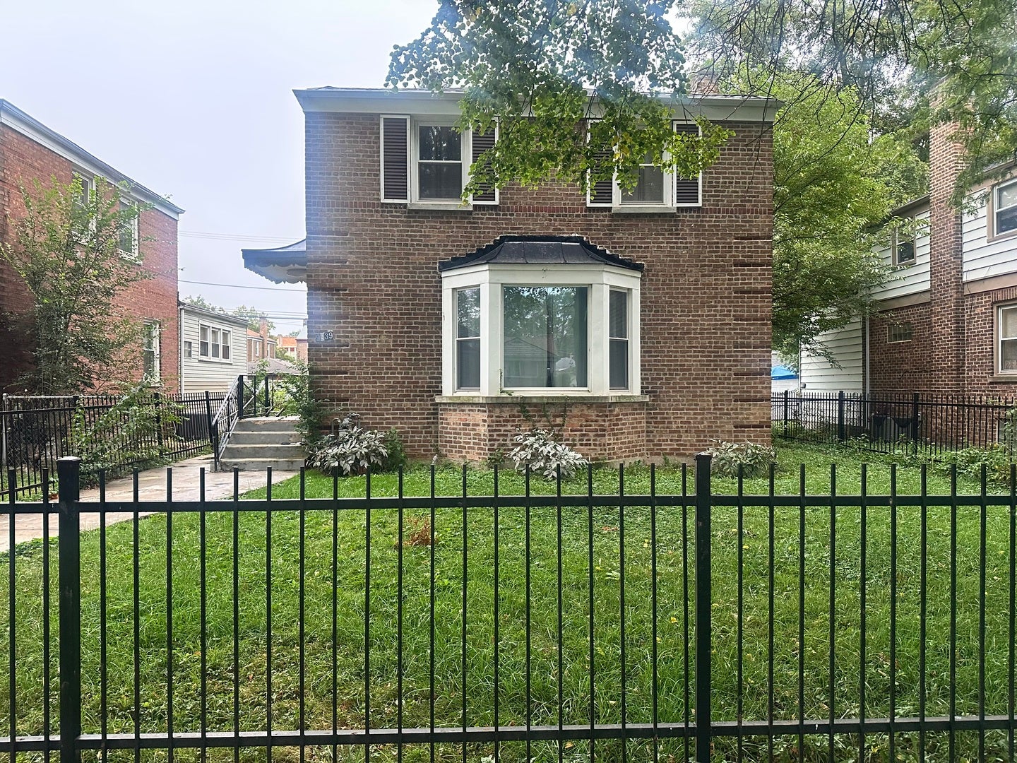 9939 S Paxton Avenue — photo