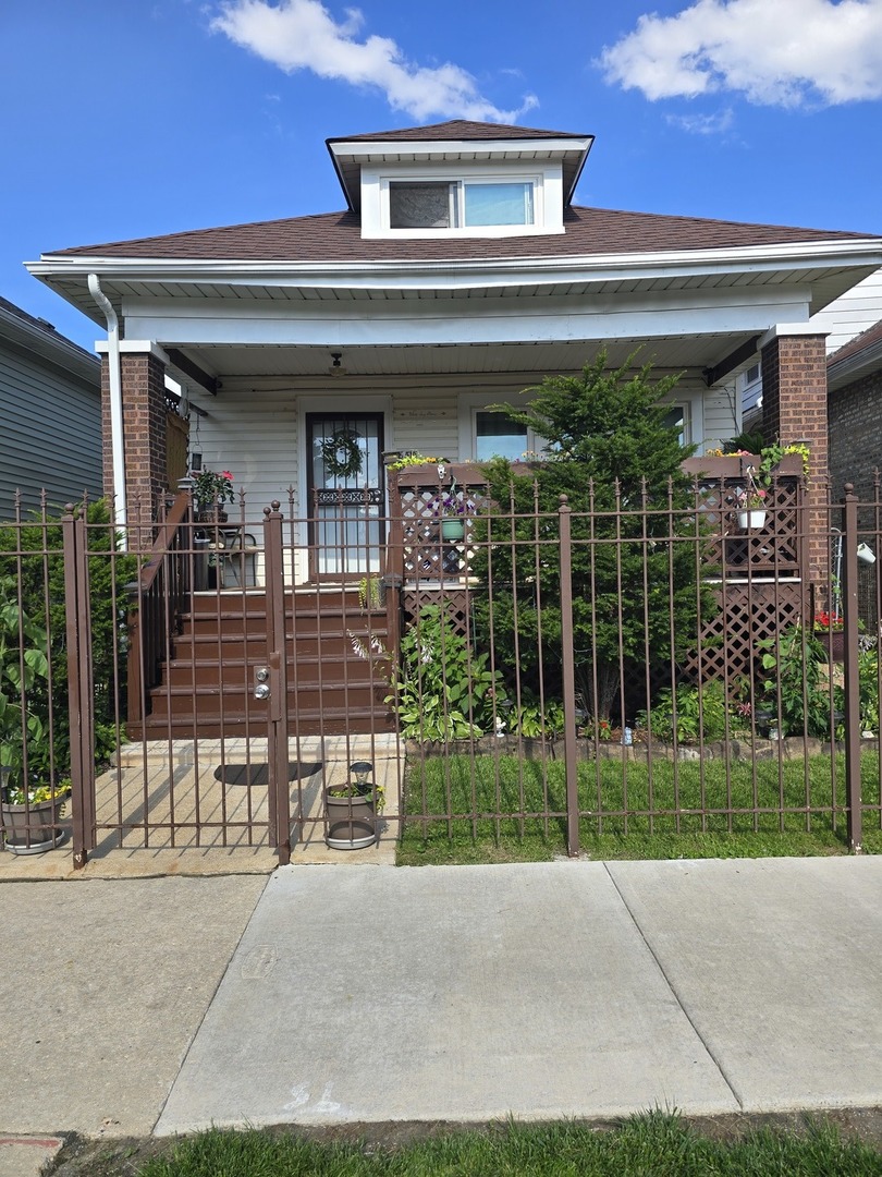 6515 S Mozart Street — photo