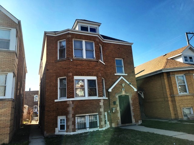 7050 S Maplewood Avenue 2 — photo