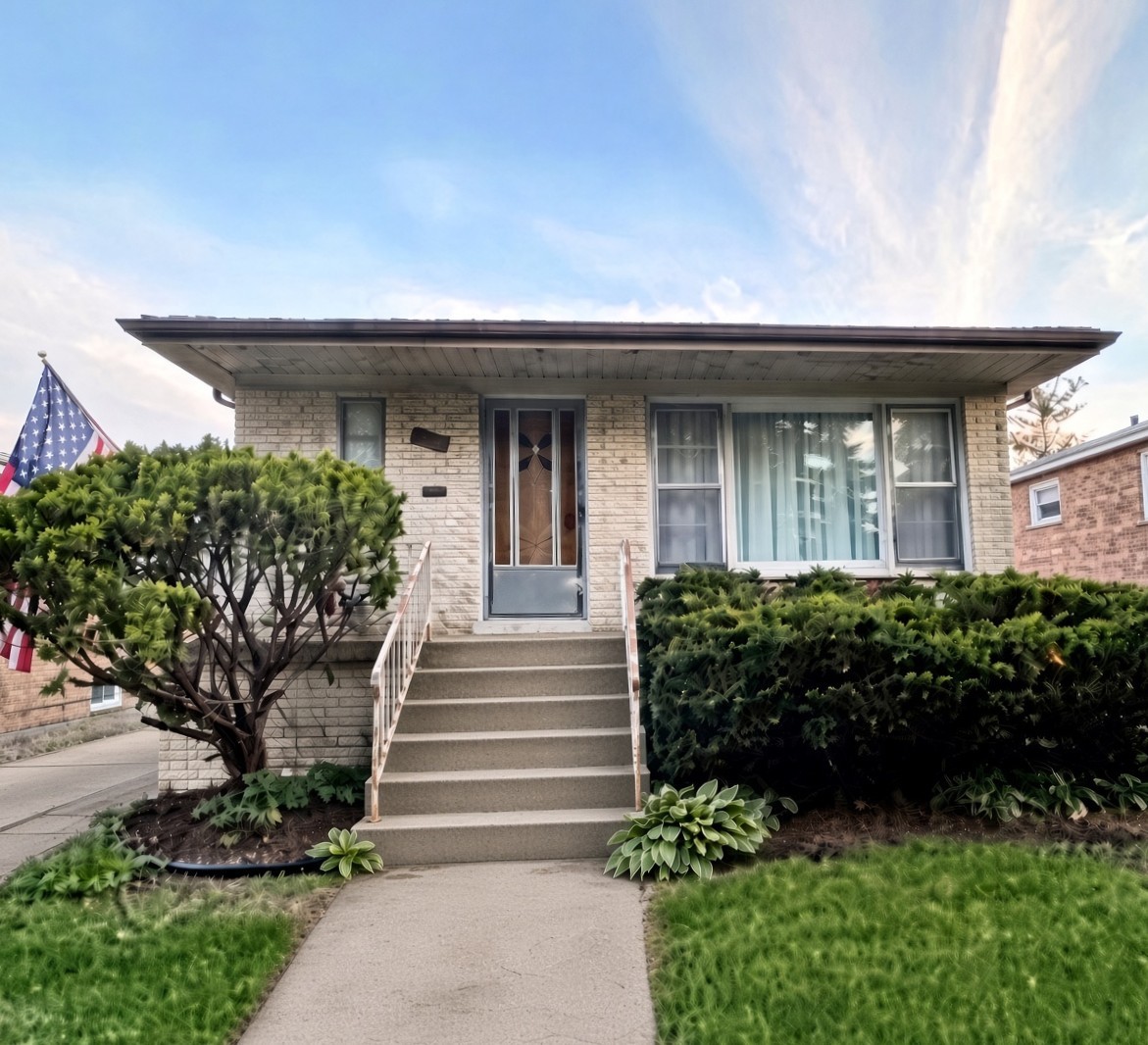 7719 W Jarvis Avenue — photo