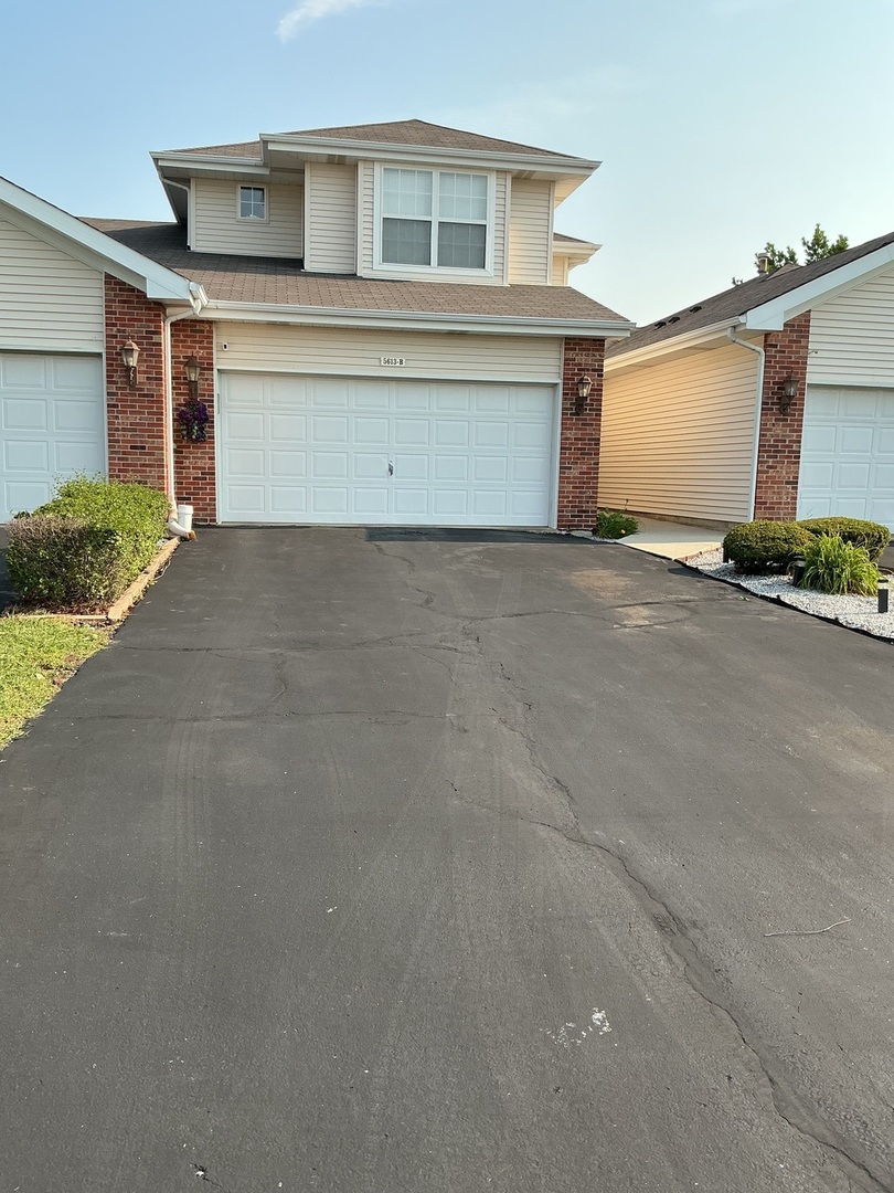 5613 W Sutton Place — photo