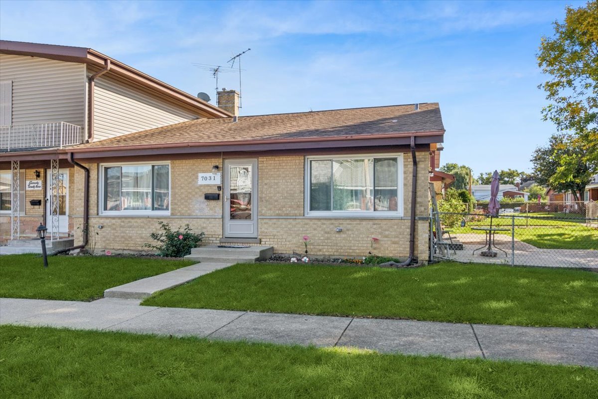 7031 W Crain Street — photo