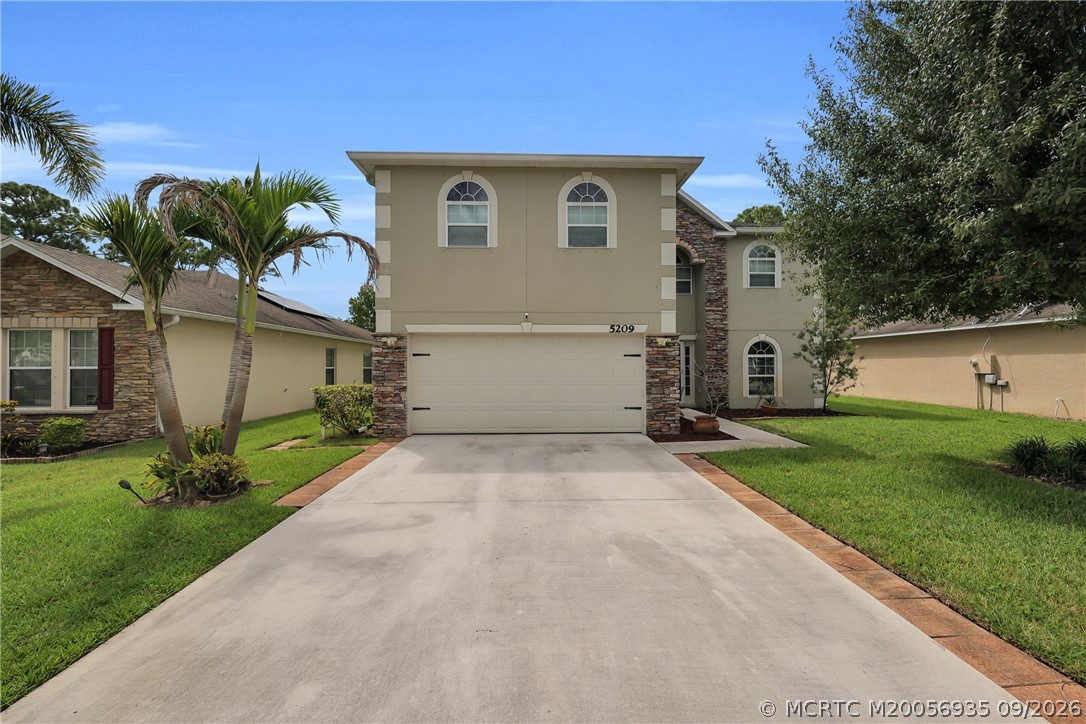 5209 NW Wisk Fern Circle NW — photo
