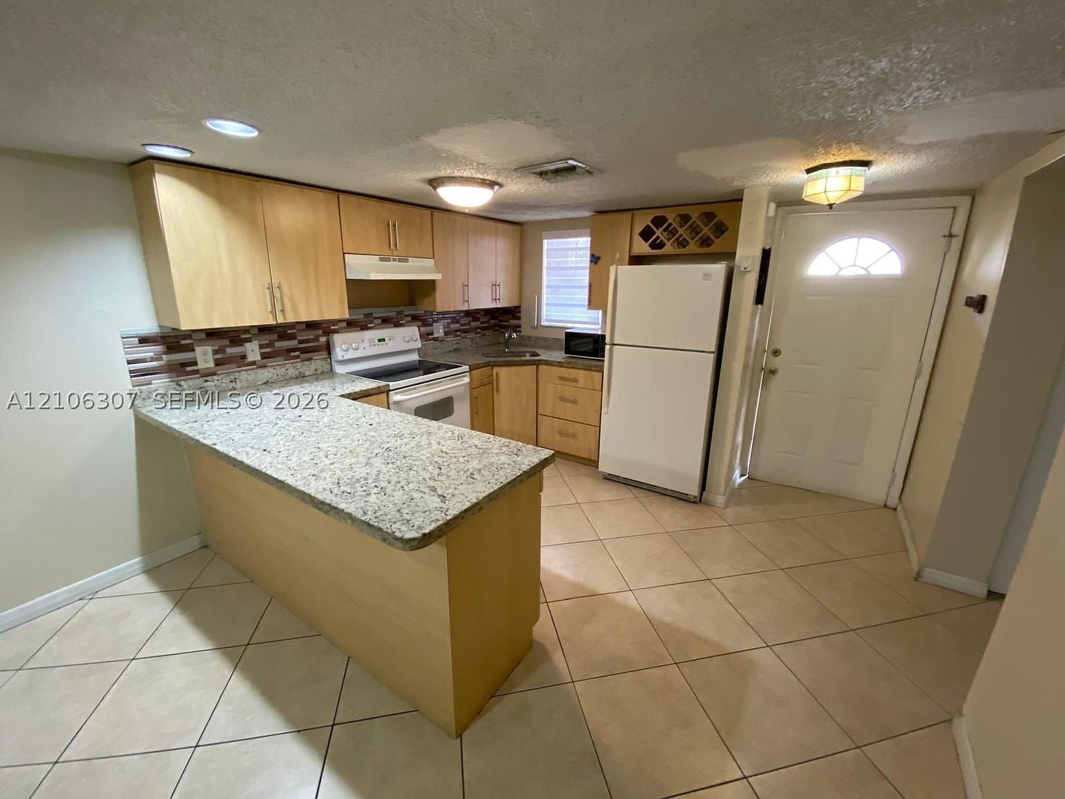 5525 W 26th Ct 106 — photo