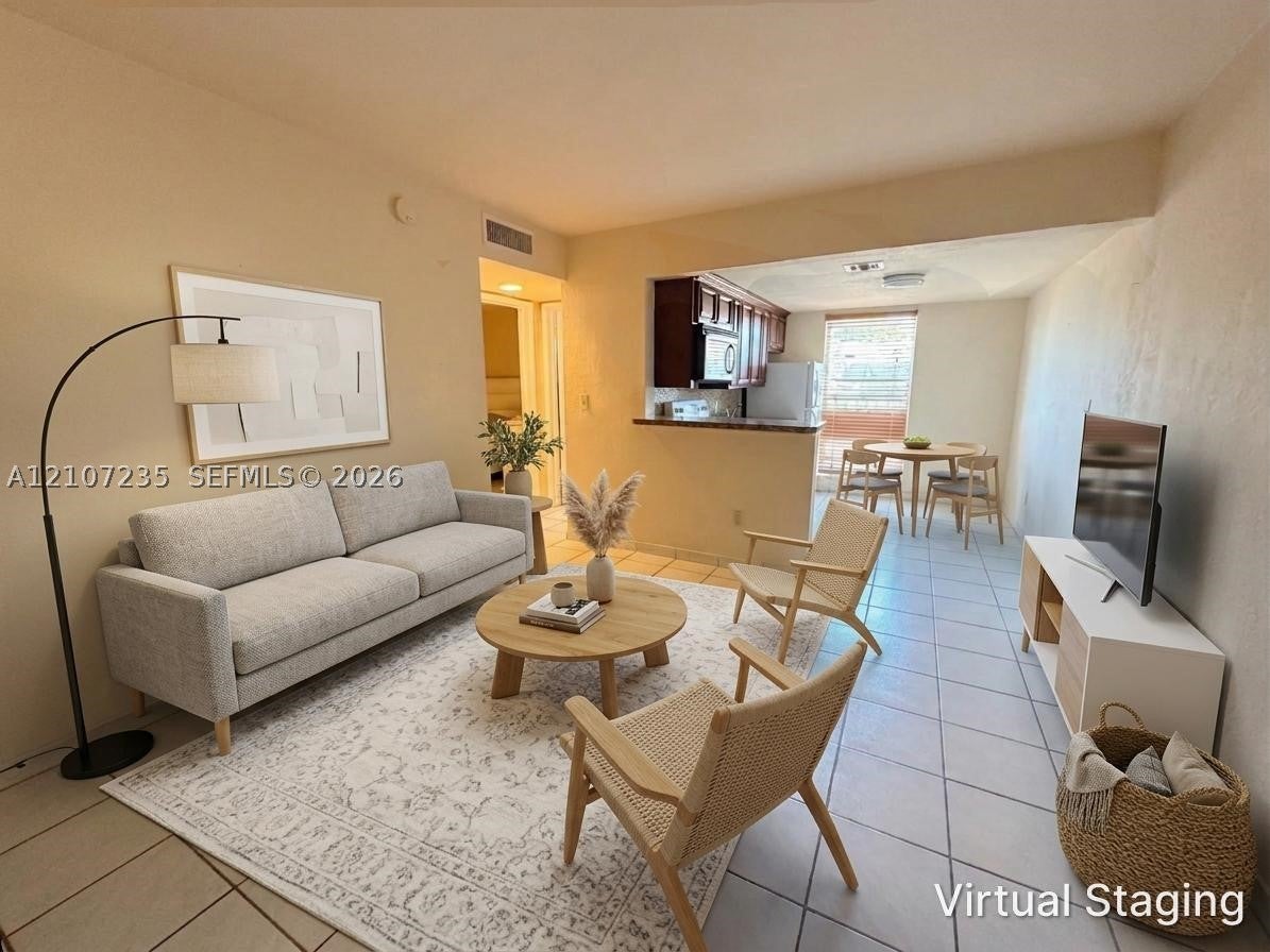 241 S Royal Poinciana Blvd 205 — photo