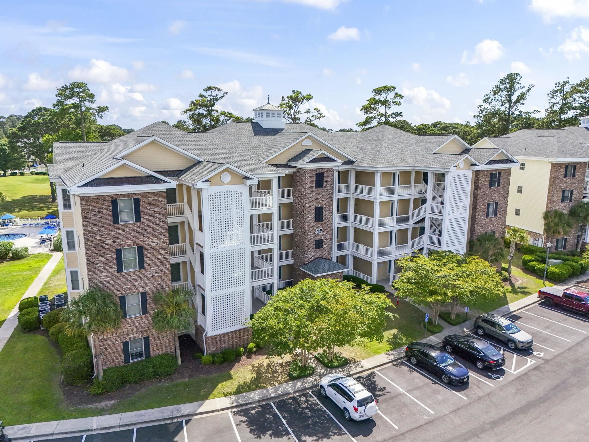 4890 Luster Leaf Circle 203 — photo