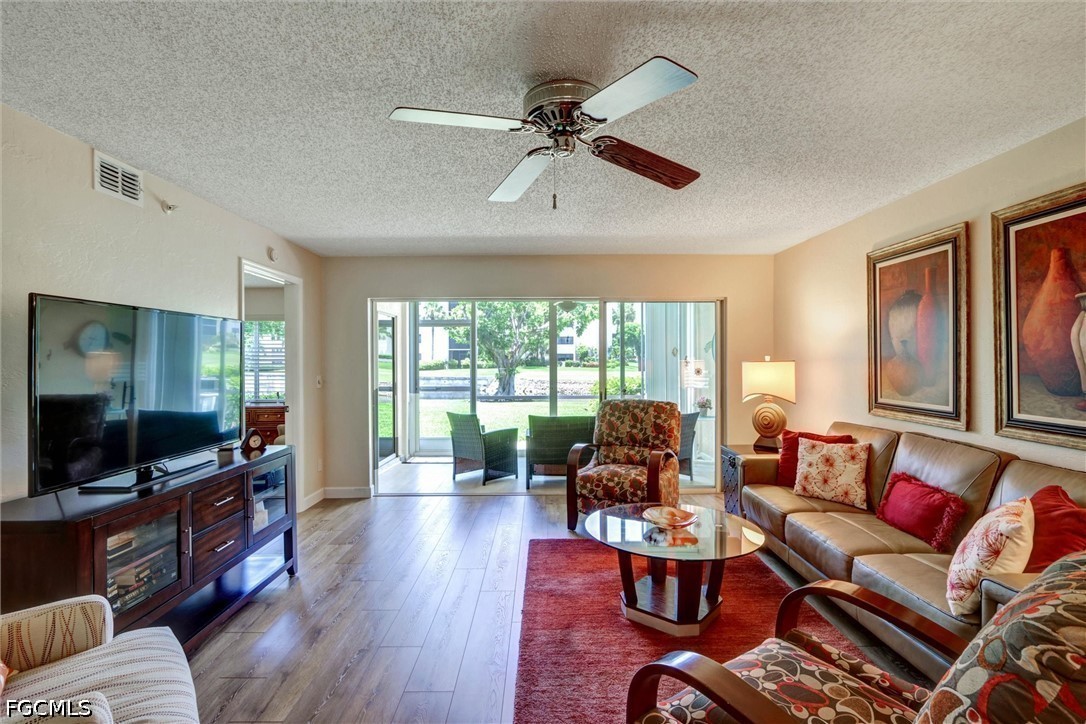 9900 Sunset Cove Ln Unit 114 — photo