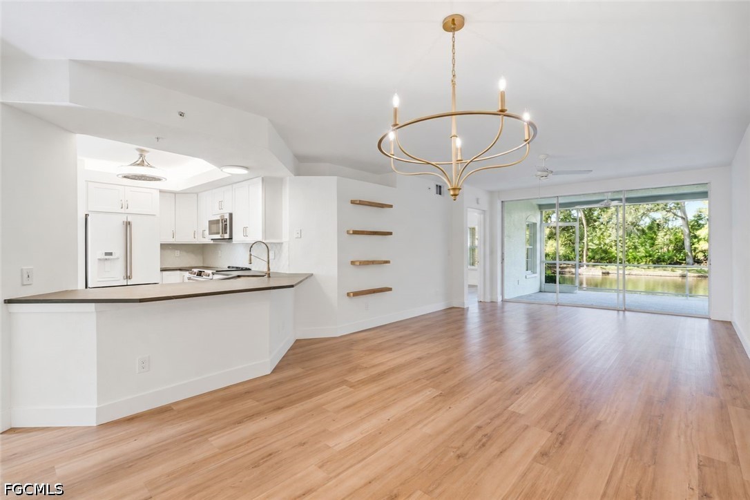 6801 Satinleaf Rd S Unit 103 — photo