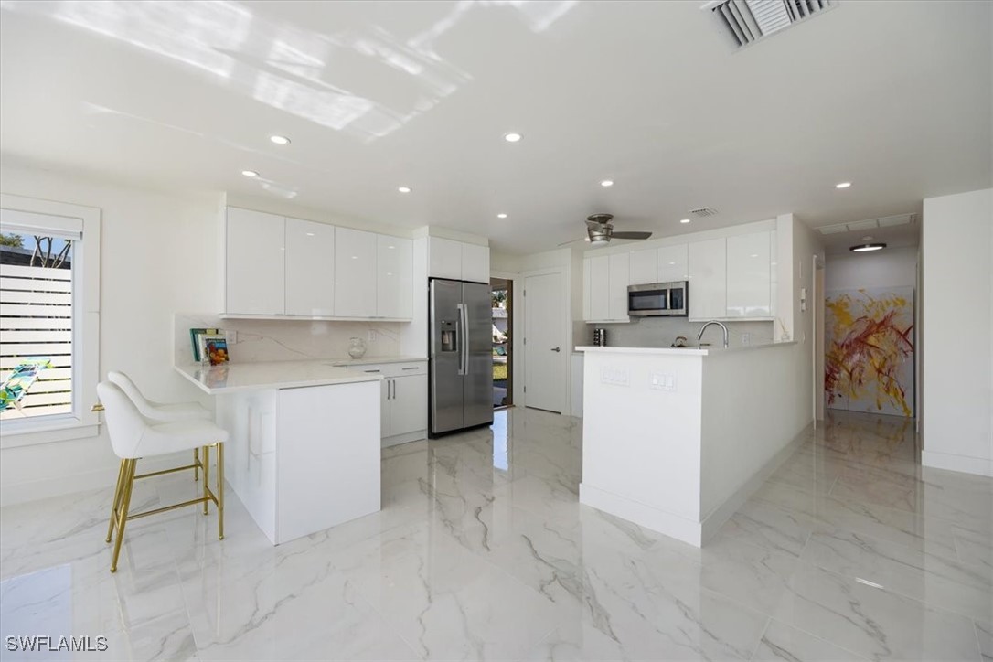 16 Knights Bridge Road, Naples, FL 34112