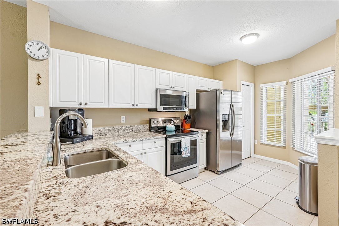 9185 Celeste Dr 1-103 — photo
