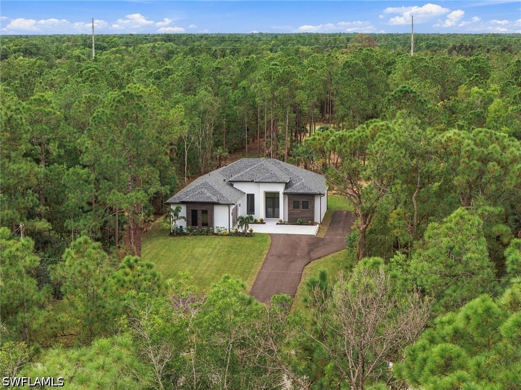 Home in Naples, FL 34120 — photo 2