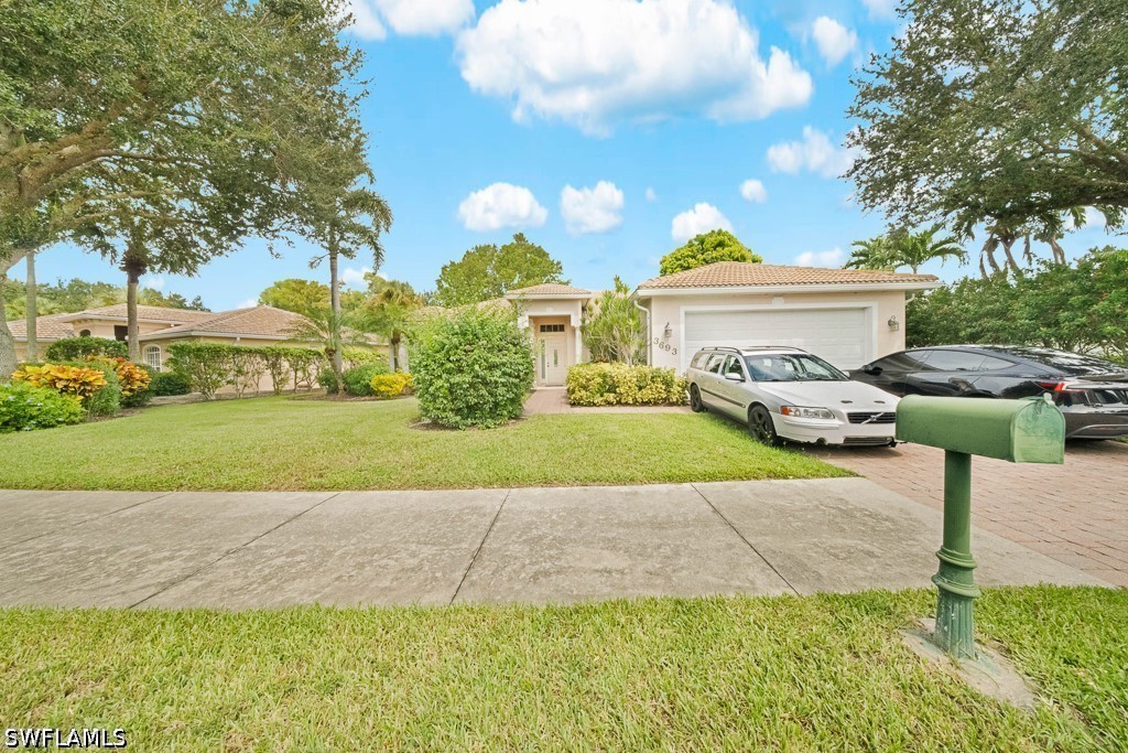 Home in Naples, FL 34116 — photo 2