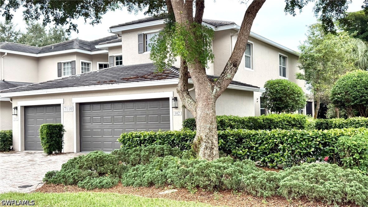 7110 Wild Forest Ct Unit 102 — photo