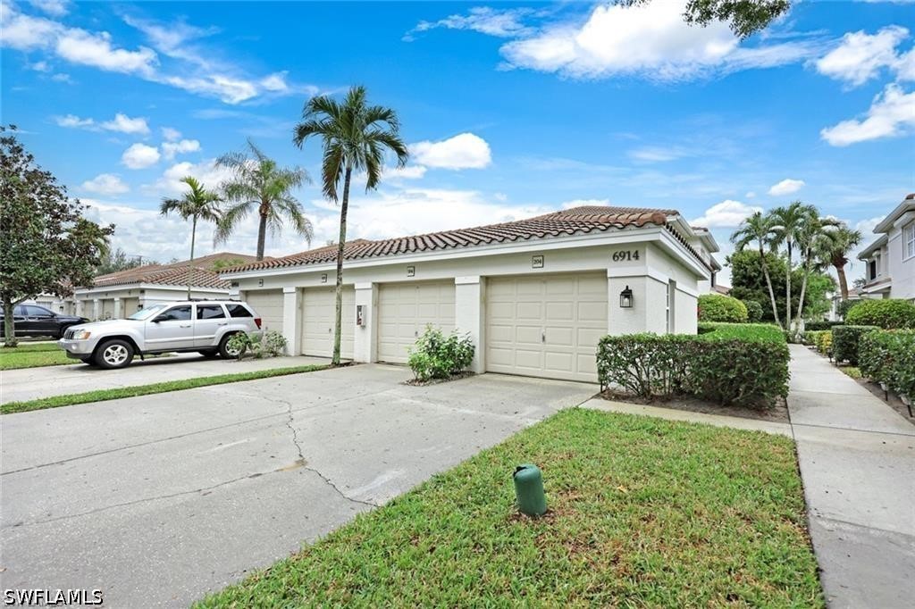 6914 Satinleaf Rd N Unit 204 — photo