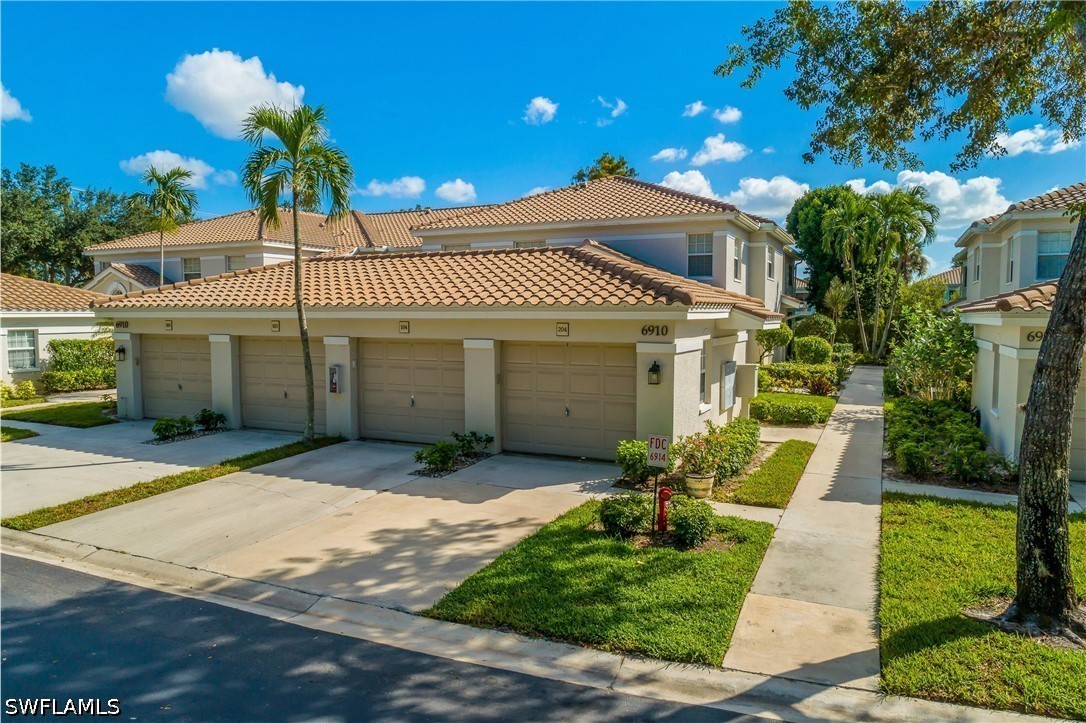 6910 Satinleaf Rd N Unit 204 — photo