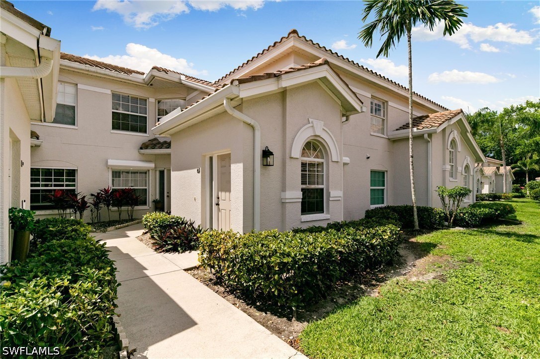 6927 Satinleaf Rd N Unit 203 — photo