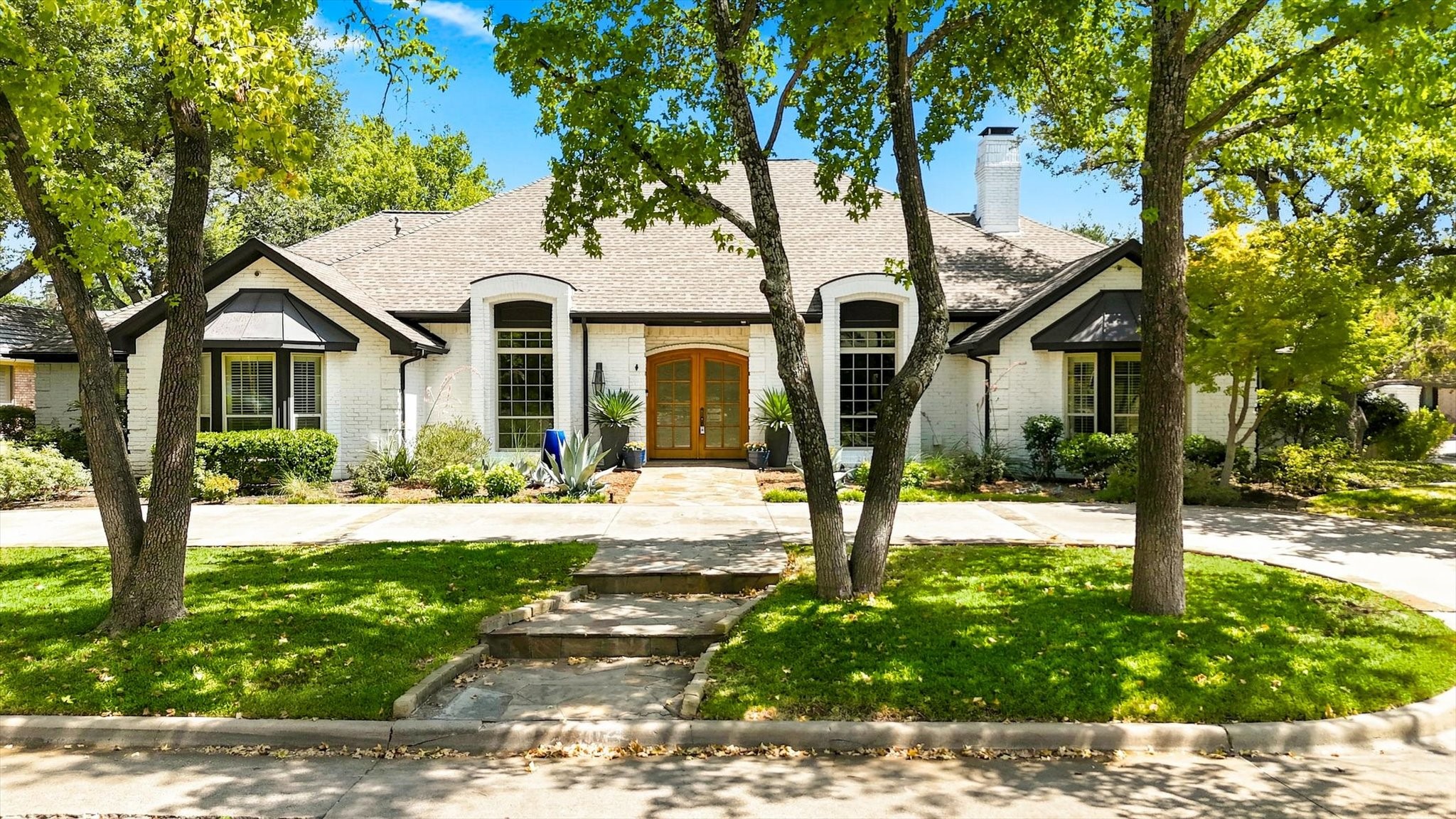 5702 Club Oaks Drive — photo