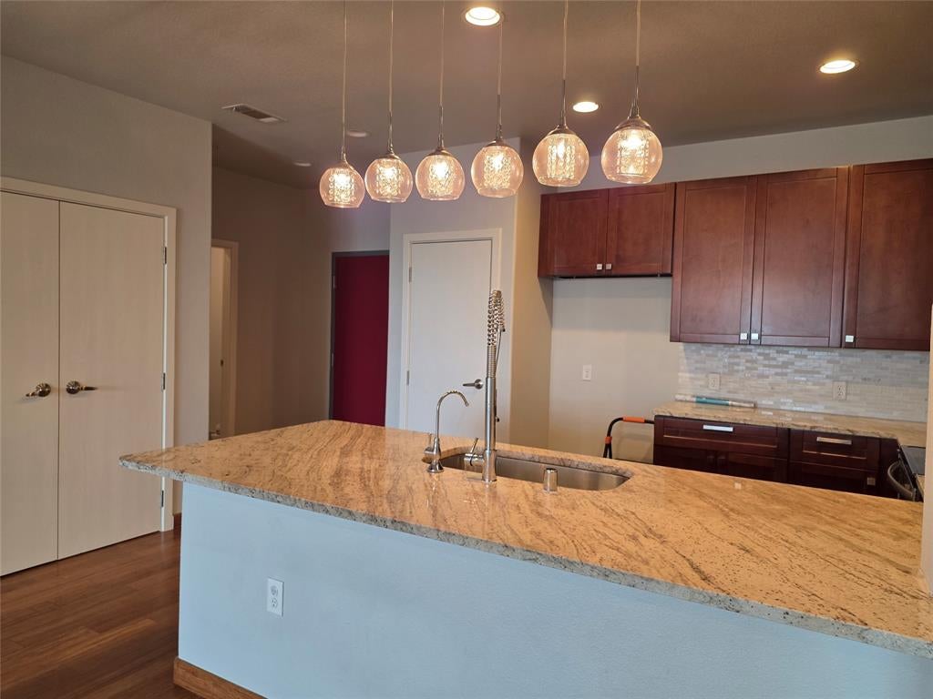 1220 W Trinity Mills Road 4002 — photo