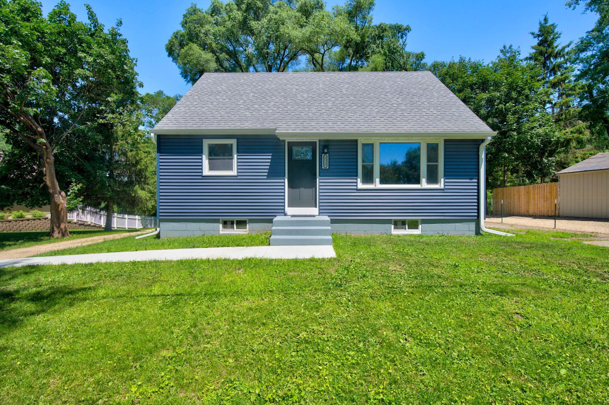 2115 E River Road NE — photo