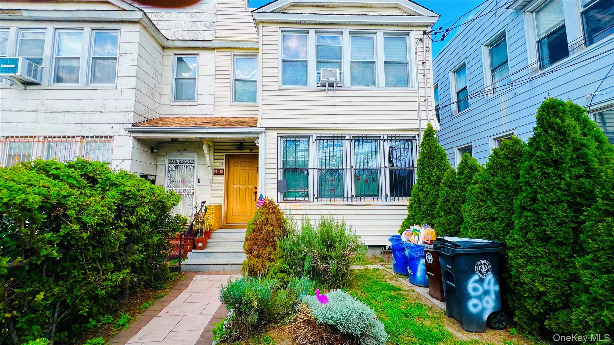 64-09 Woodside Avenue 2 Family Frame — photo