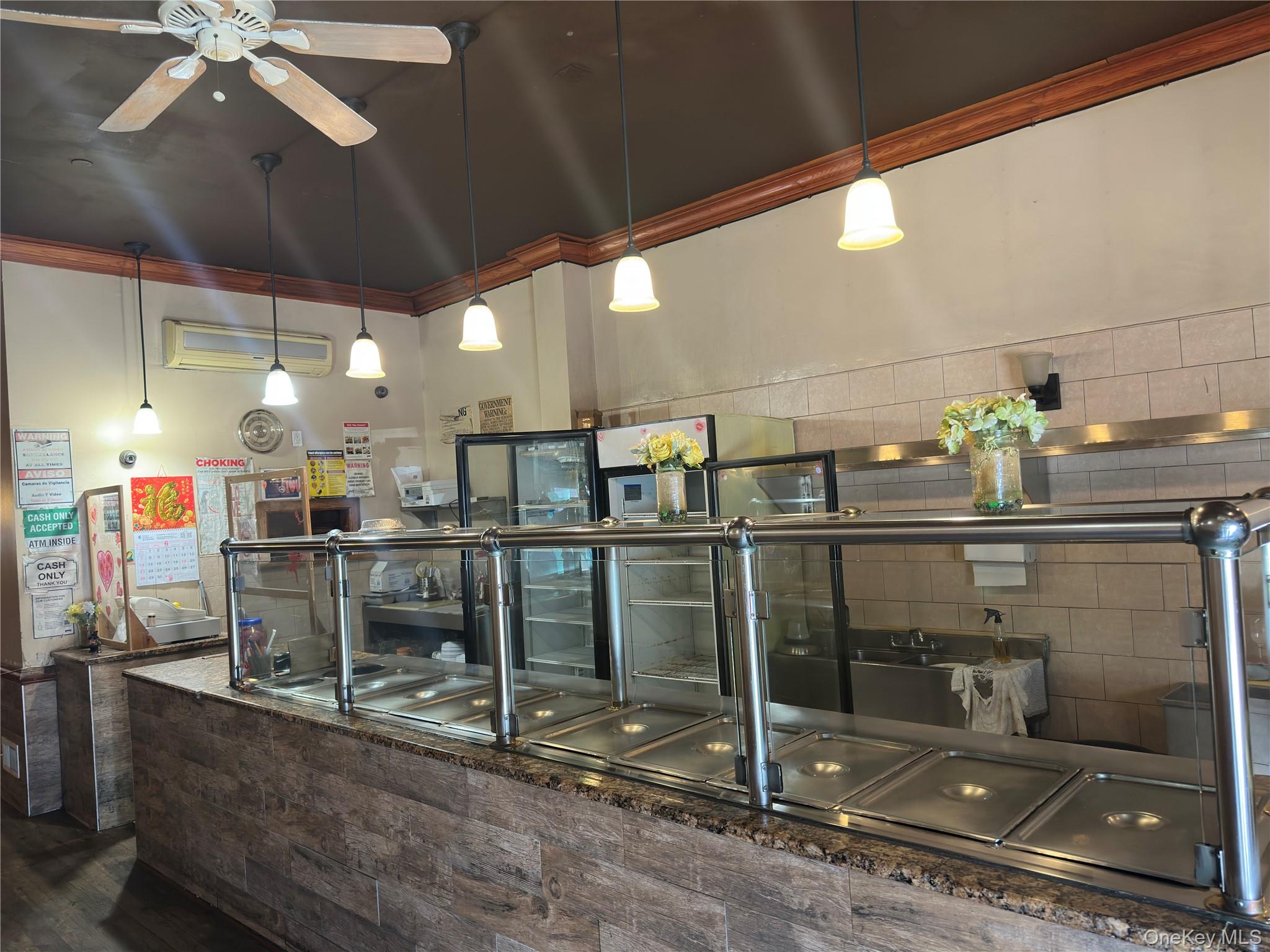 5613 Metropolitan Avenue Ground Floor Retail — photo