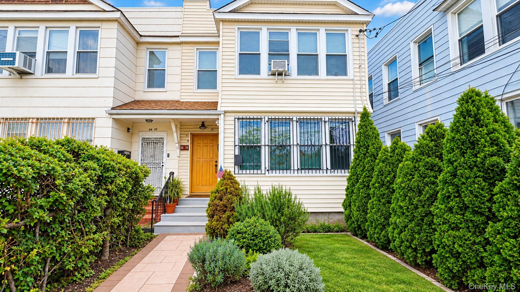 64-09 Woodside Avenue 2 Family Frame — photo