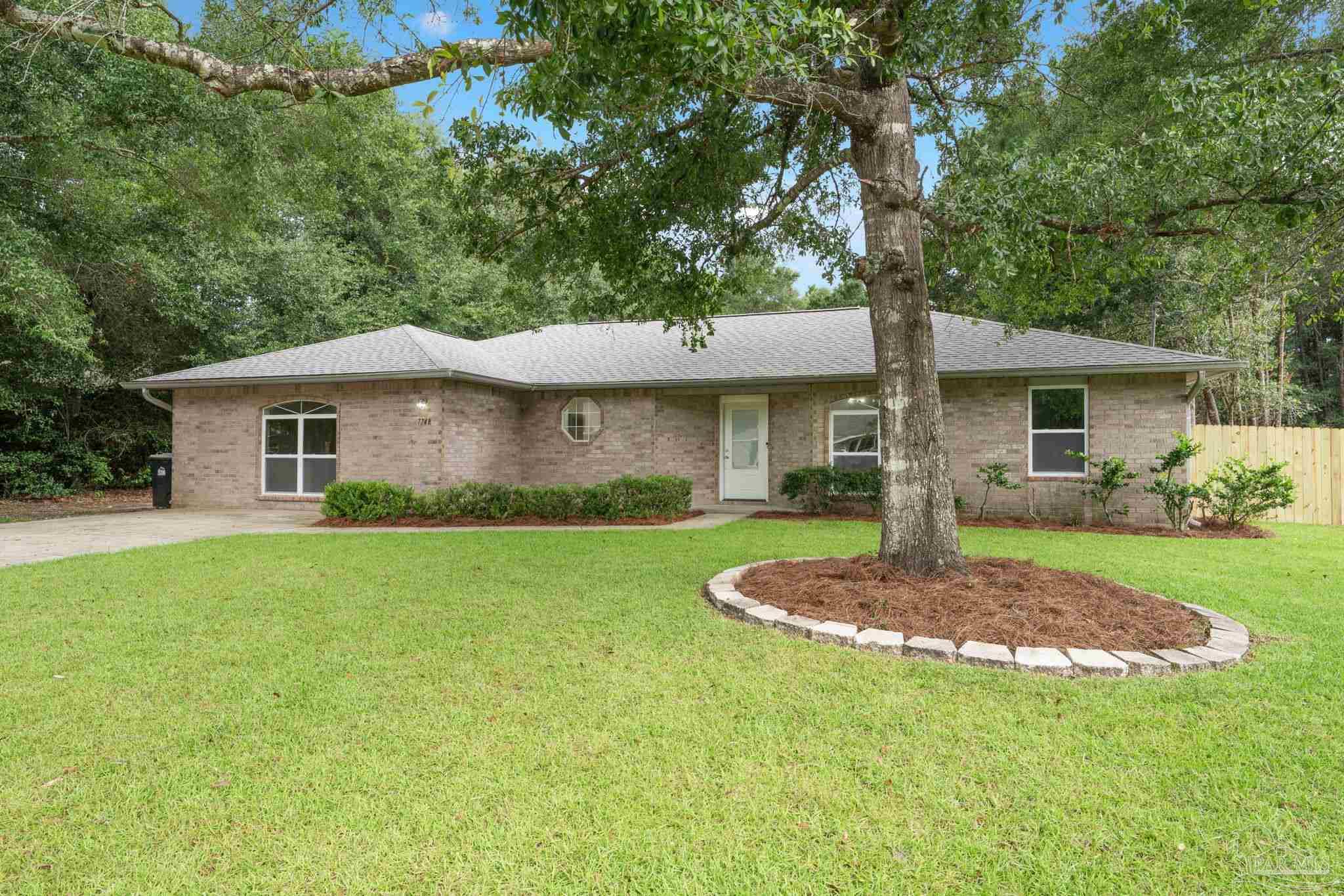 7448 Rustling Pines Dr — photo