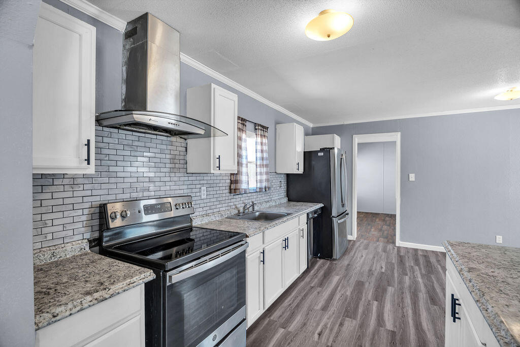 606 Michael, Stanton, TX 79782 — photo 2