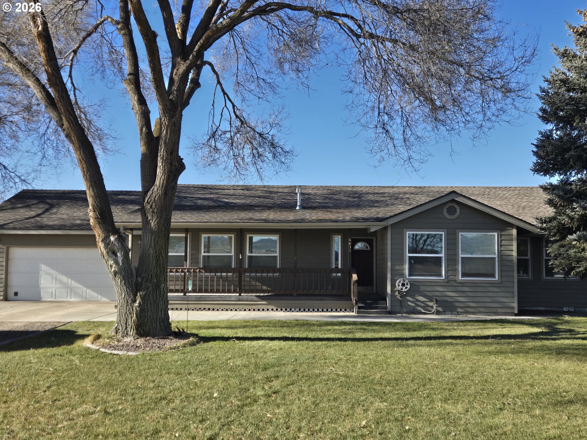 6631 NW Puckett Rd — photo