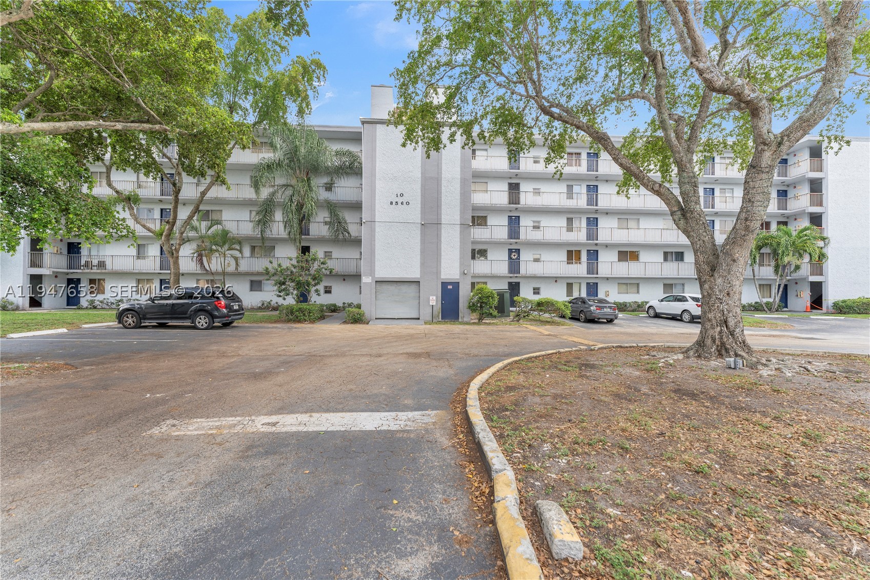 8560 N Sherman Cir Unit 208 — photo
