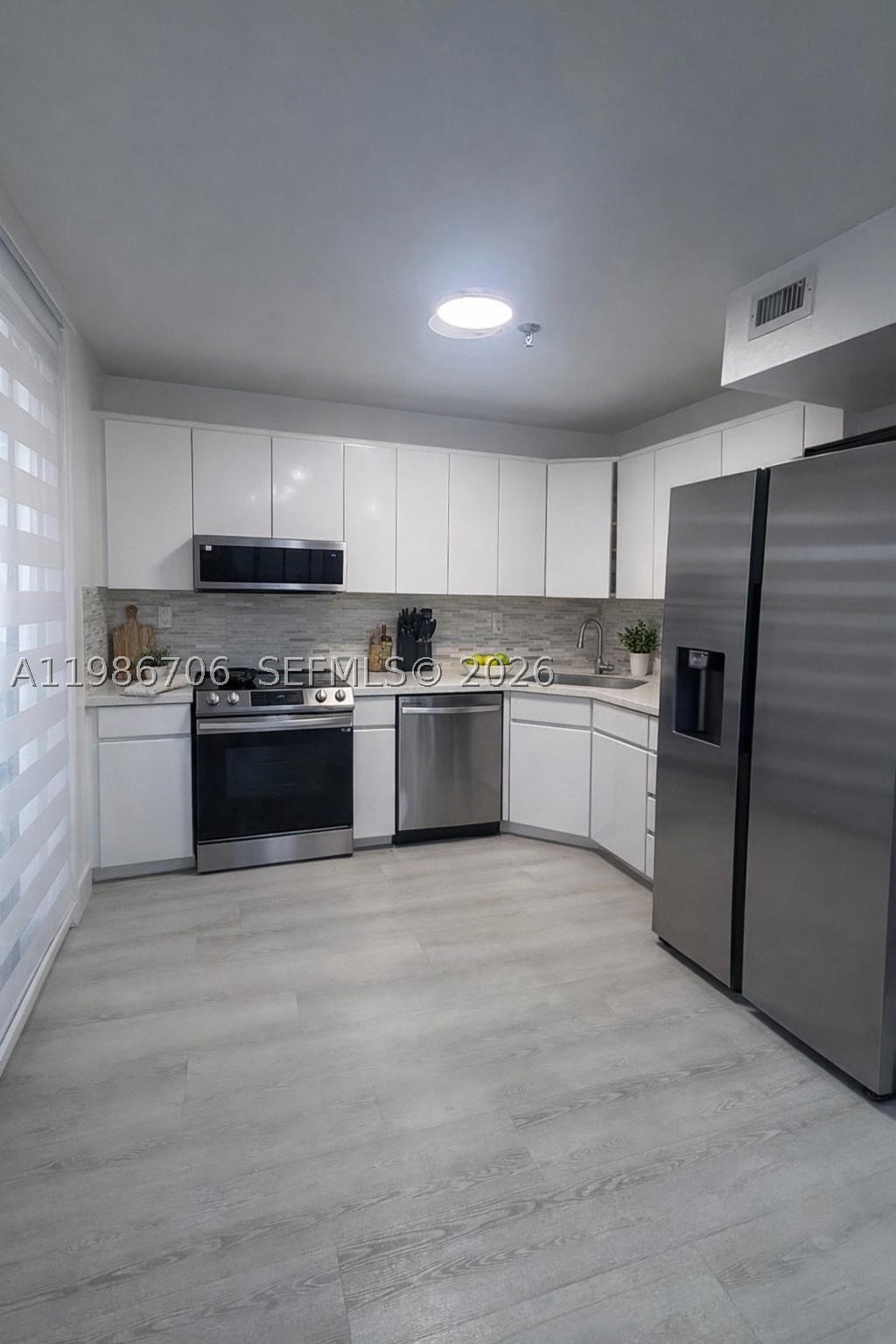 671 NE 195th St 219-E — photo