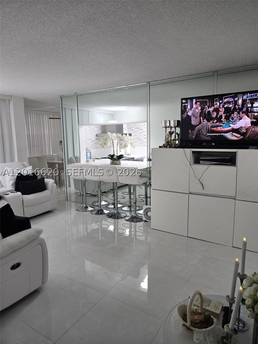 9410 Live Oak Pl 103 — photo